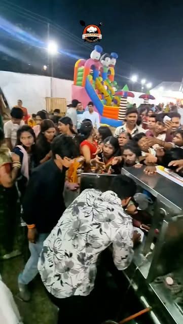 Crowd at the Lallantop fair stall at night